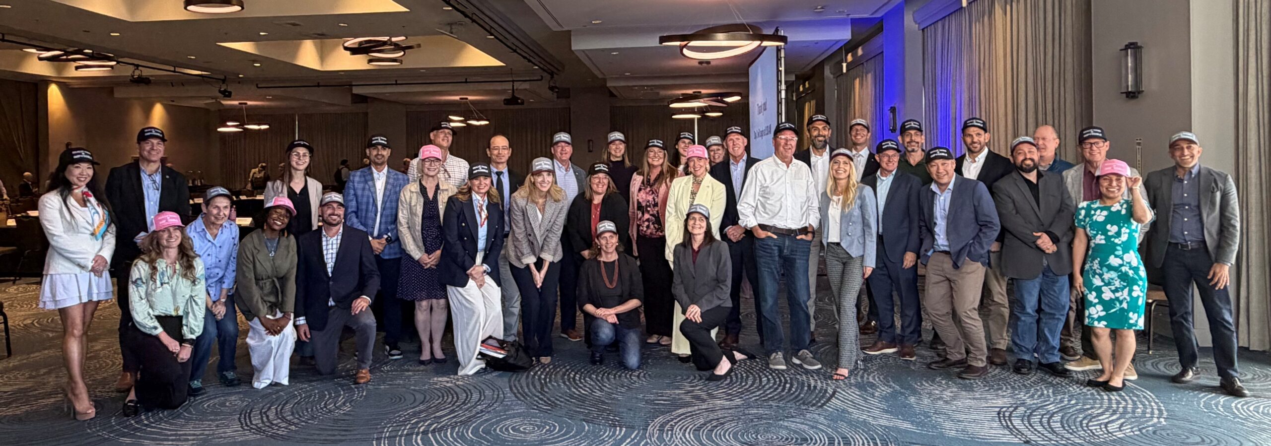 AC_Group Shot_With Hats